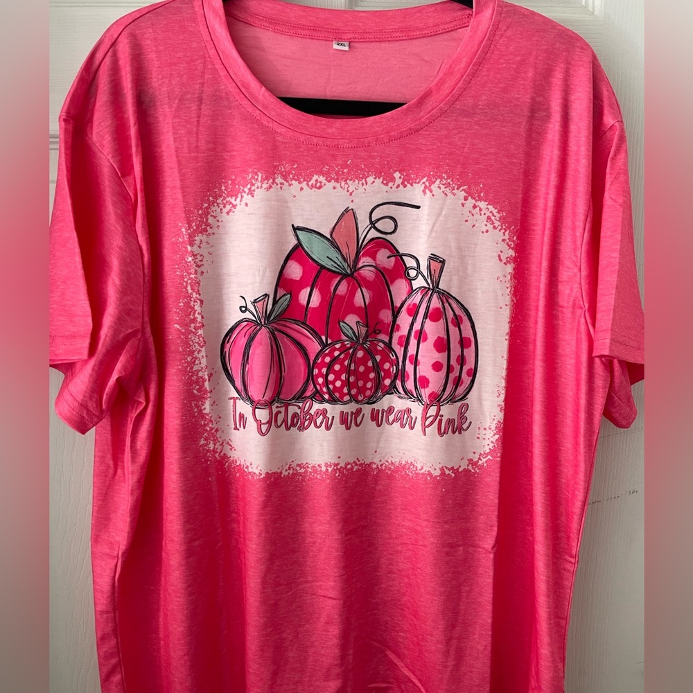 Fall breast cancer awareness T-shirt size is 2XL